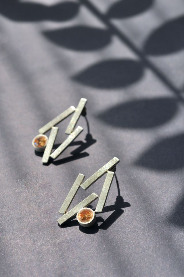Boucles d'Oreille Ambre : guide, vertus et style