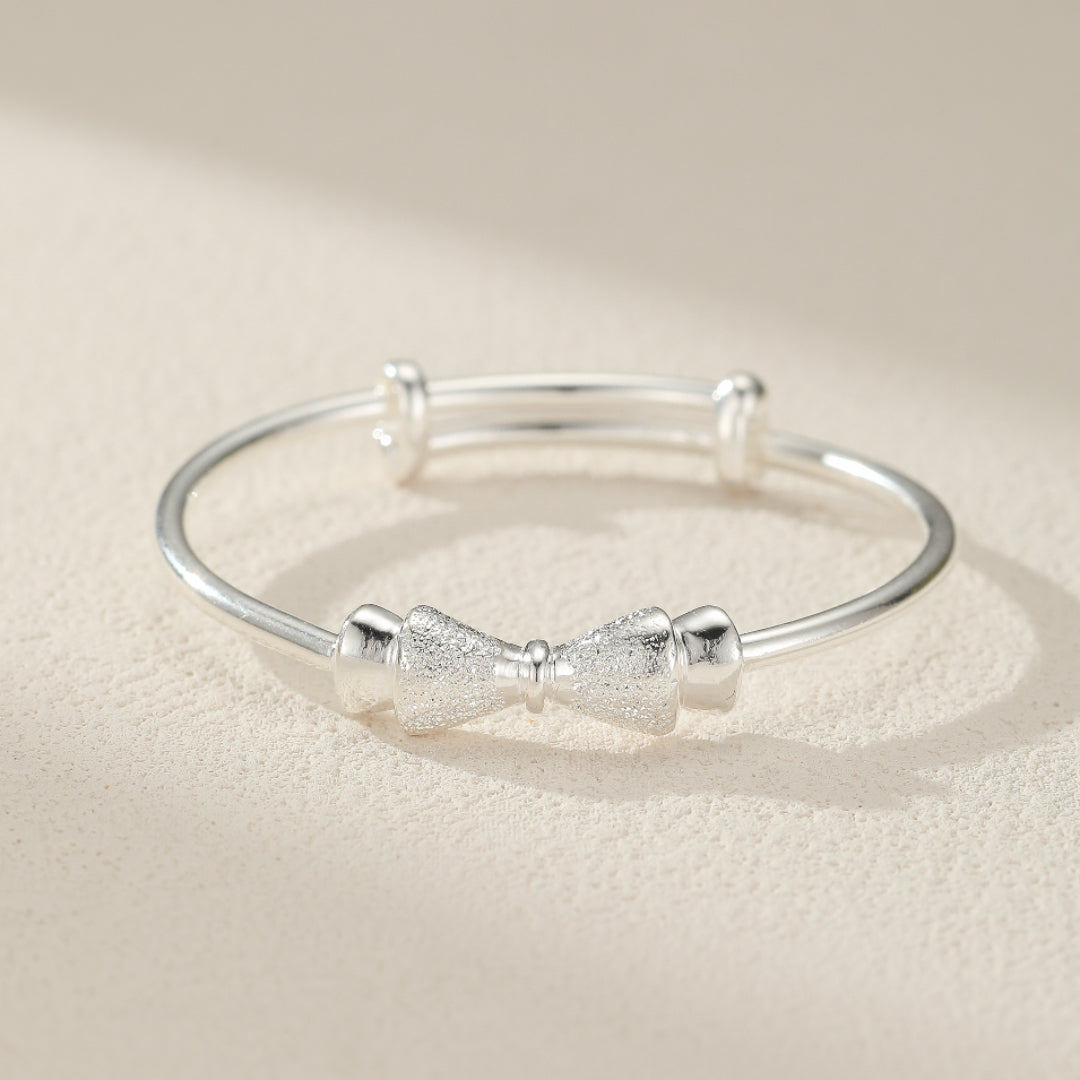 Bracelet Enfant Nœud Papillon – Douce Élégance, Argent