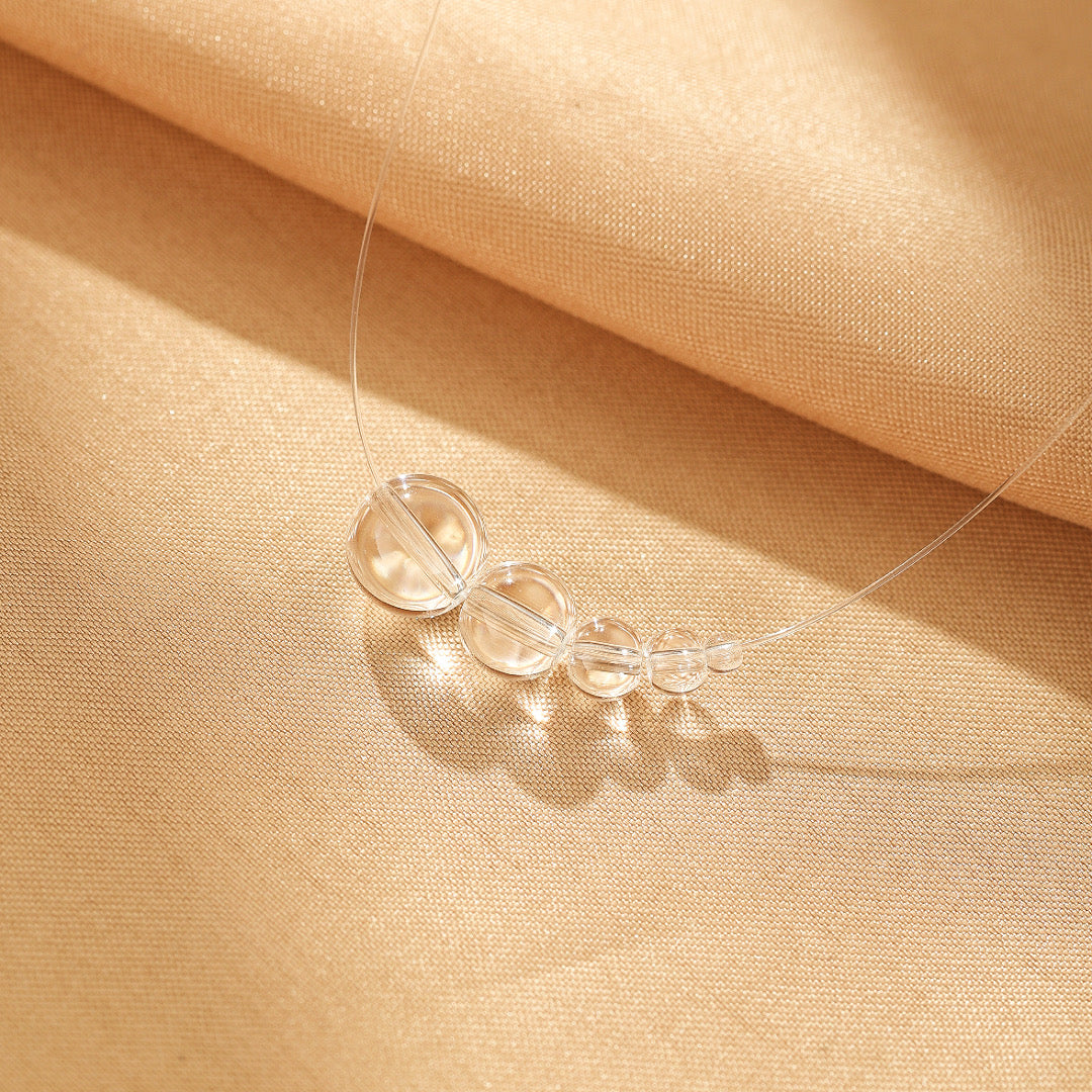 Collier Flottant Quartz Clair – Voile Lumineux