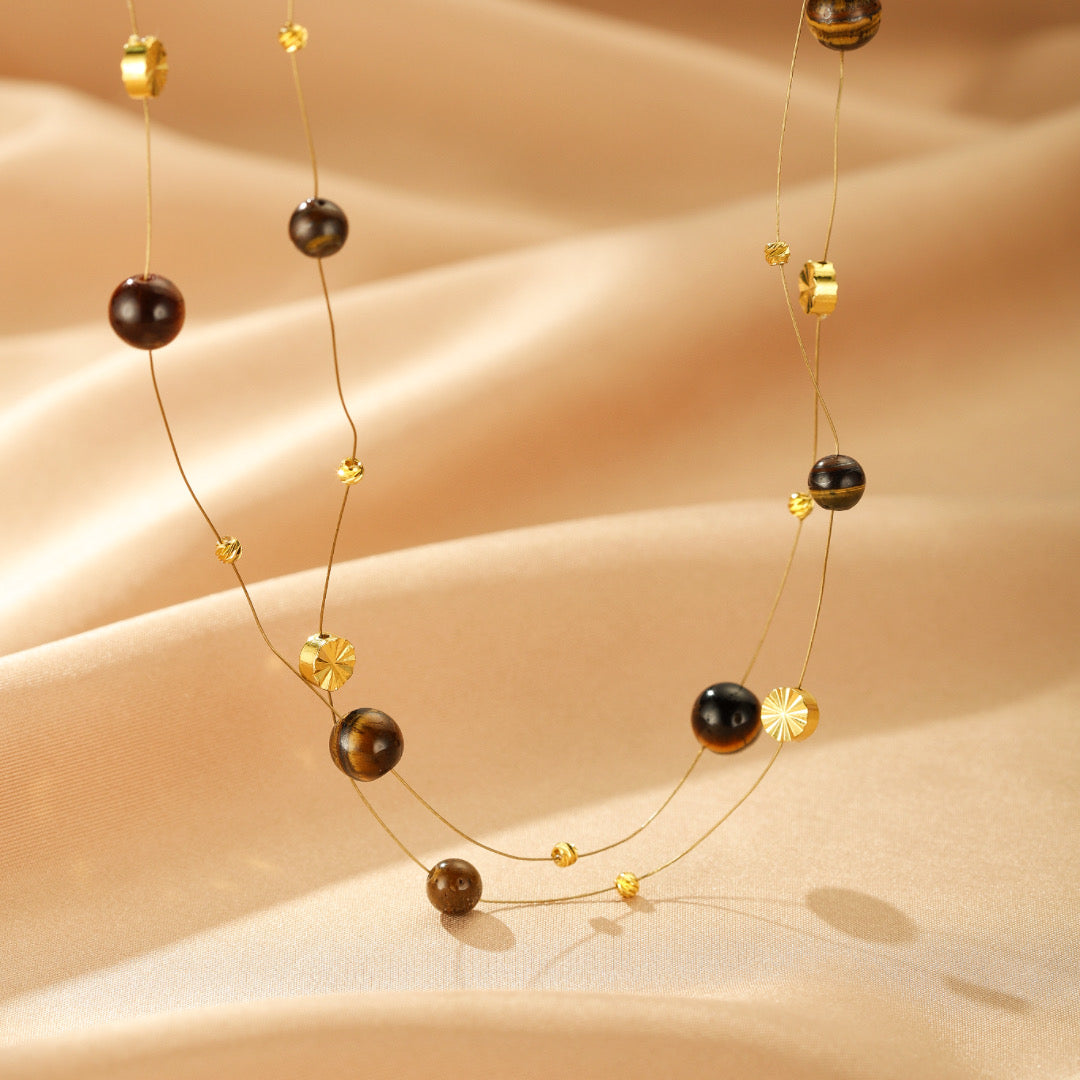 Collier Flottant Œil de Tigre – Sagesse Dorée