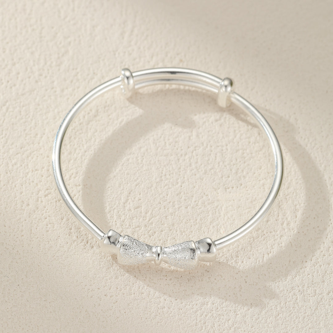 Bracelet Enfant Nœud Papillon – Douce Élégance, Argent