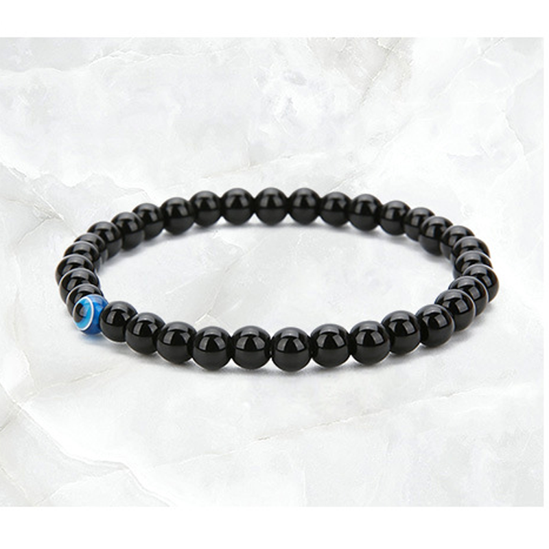 Bracelet Mauvais Oeil ‘Apaisement’ en Agate Noire Moment ici