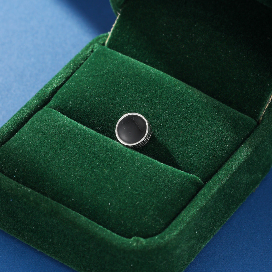 Set of men's Greek key magnetic earrings, demonstrating the style and black stainless steel finish