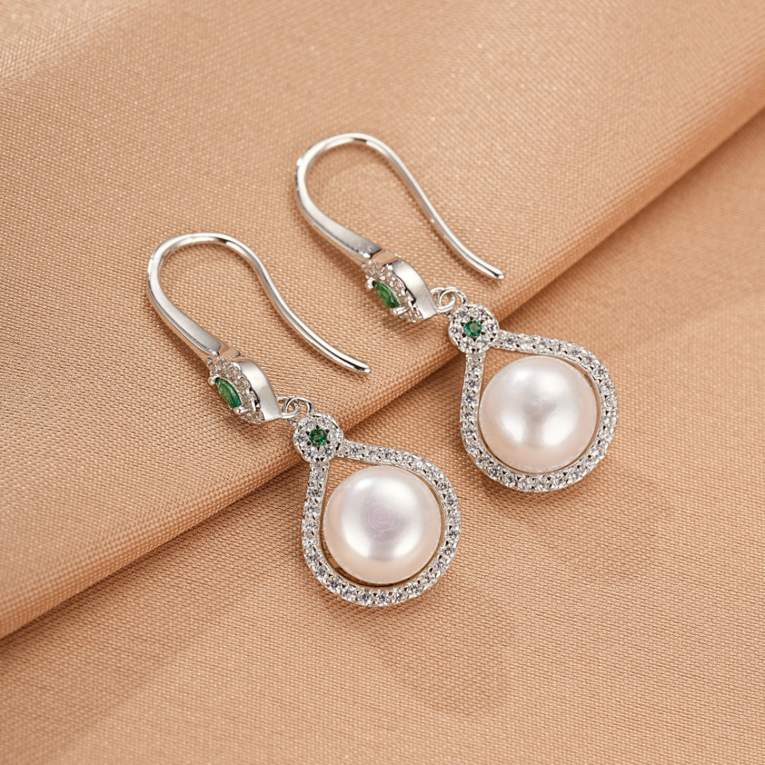 Boucles d’oreilles pendantes en argent 925 avec perle blanche et zircons verts, style Elegancia.