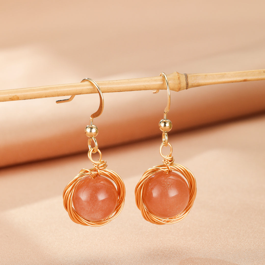 Boucles d'Oreilles Pierre de Soleil – Nids Solaires