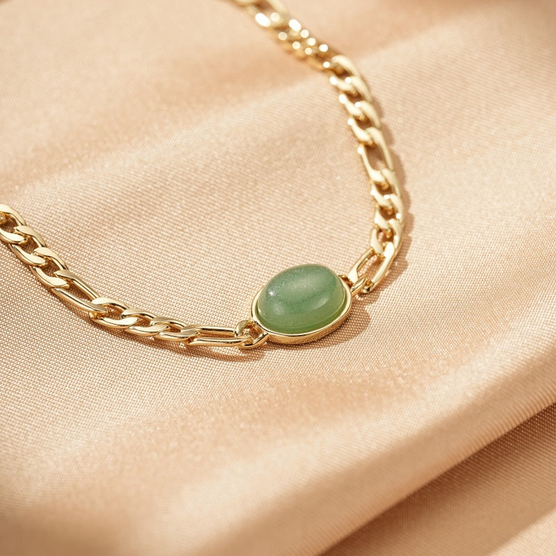 Bracelet en aventurine verte avec chaîne dorée de style figaro