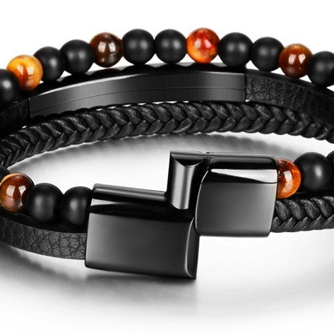 Bracelet en cuir tressé avec perles œil de tigre et fermoir magnétique noir, style protecteur.