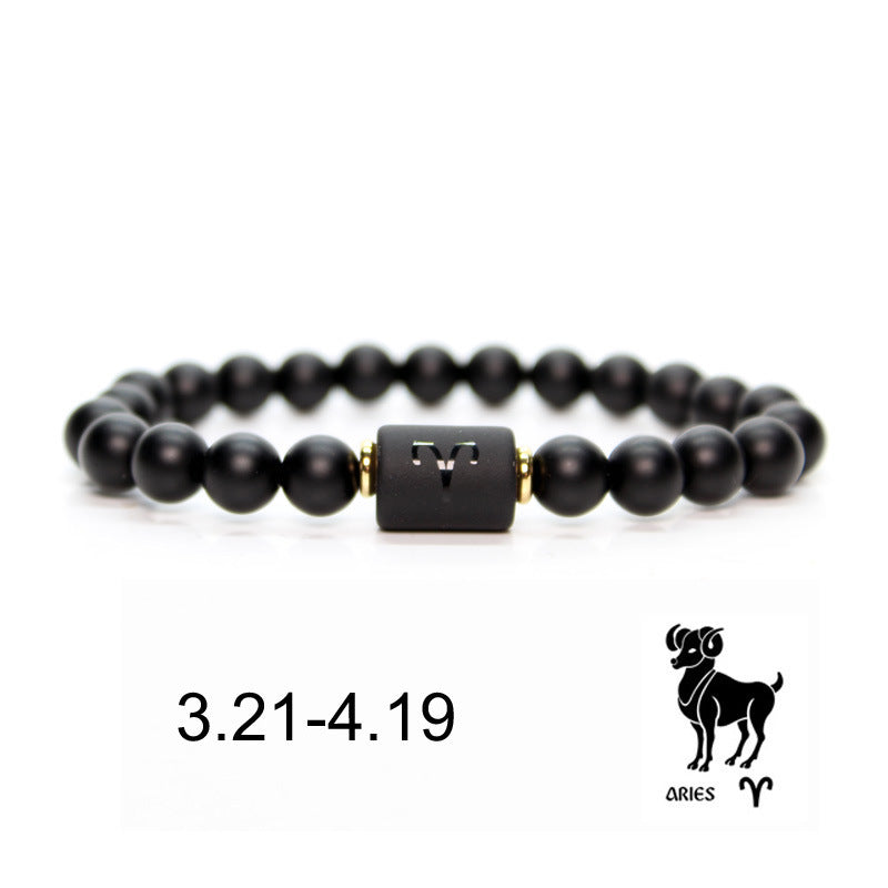 Bracelet en onyx noir avec le signe astrologique du Bélier gravé sur un élément central rectangulaire, dates 3.21-4.19 et symbole du Bélier.