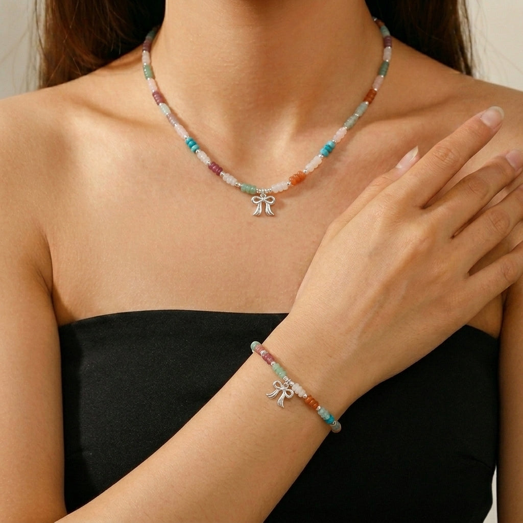 Ensemble collier et bracelet "Nœud de Bonheur" en argent, ornés de perles d'aventurine, jade, aigue-marine et quartz fraise.