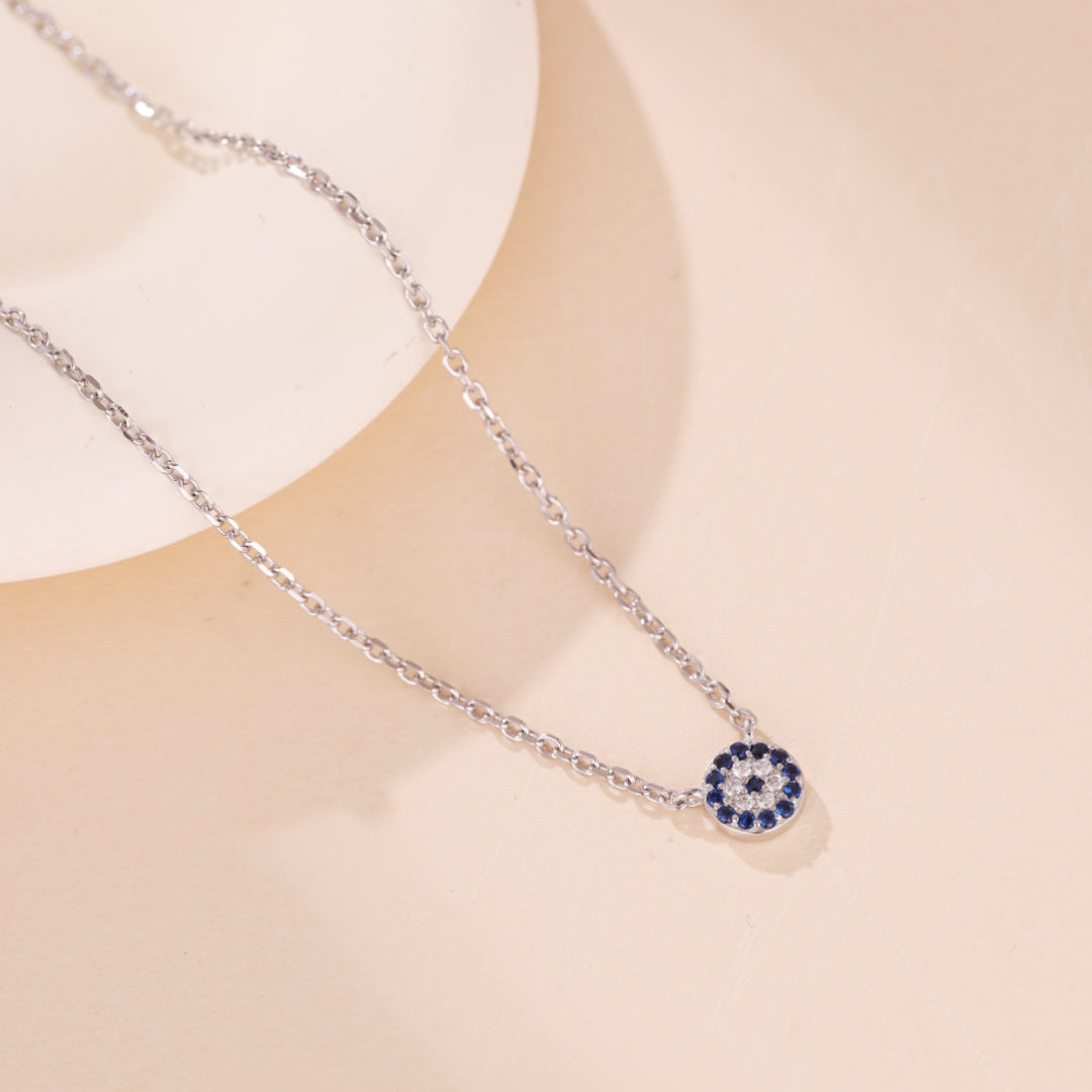 Collier fin en argent 925 avec un pendentif œil bleu serti de cristaux bleus et blancs