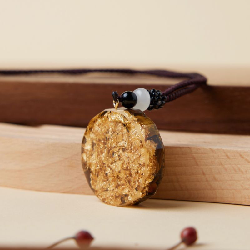 Pendentif Orgonite Sri Yantra en Œil de Tigre – Équilibre Universel