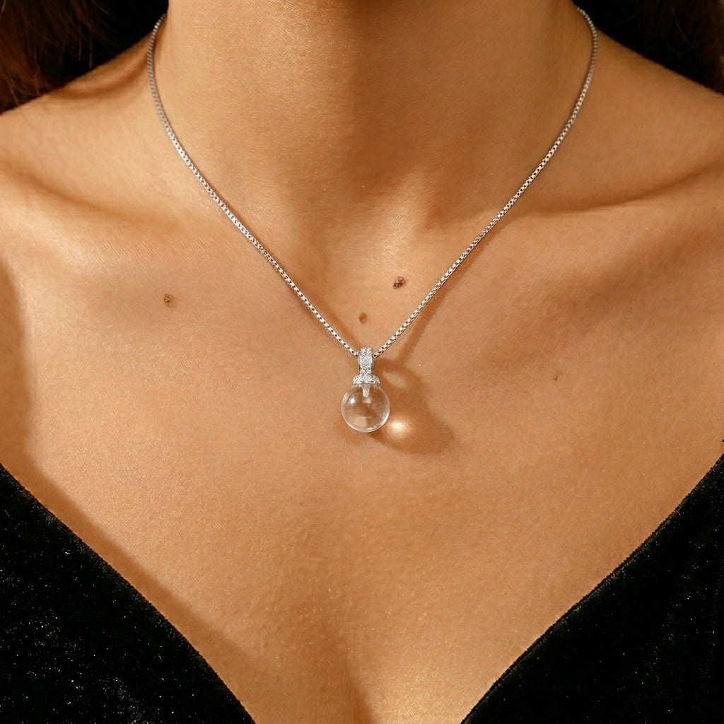 Collier Cristal de Roche – Sphère Lumineuse, Argent