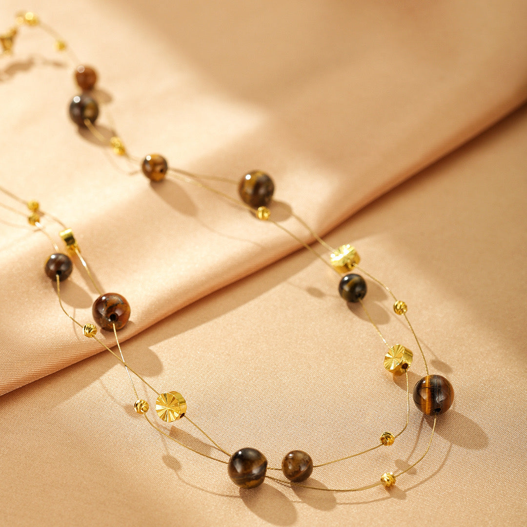 Collier Flottant Œil de Tigre – Sagesse Dorée