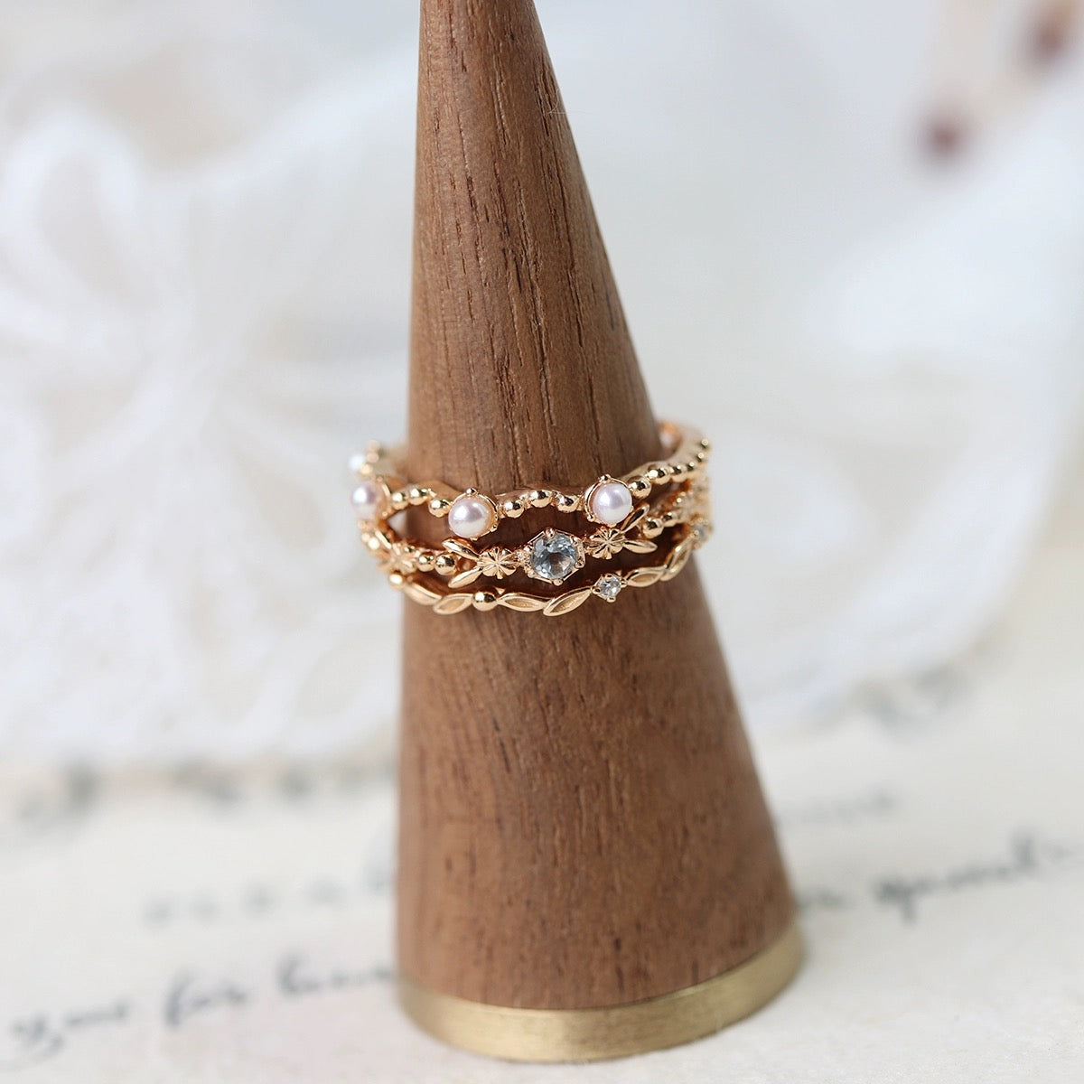 Aquamarine, Pearl, and Zircon Trio Ring – Floral Serenity