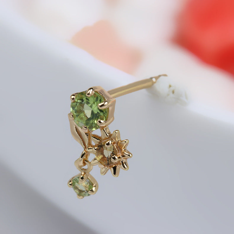 Boucle d'oreille unique en argent plaqué or ornée de péridot et de citrine, avec un design floral ensoleillé