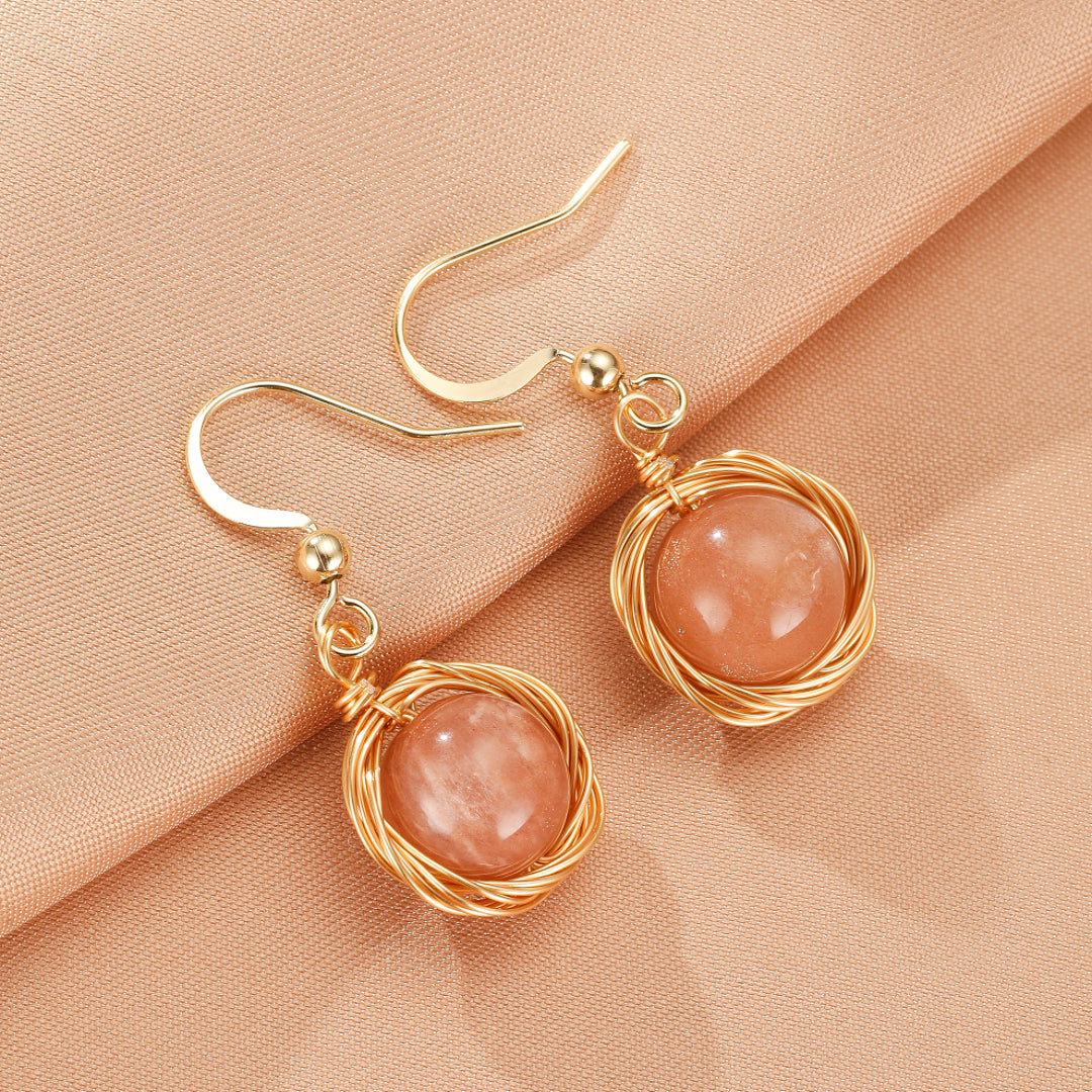 Boucles d'Oreilles Pierre de Soleil – Nids Solaires