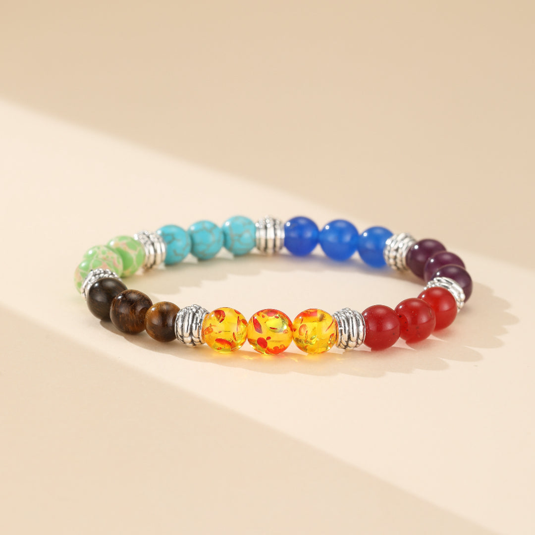 Bijou spirituel : Bracelet 7 Chakras "Sphères de Lumière" en pierres naturelles aux propriétés curatives, favorisant le bien-être et l'équilibre énergétique optimal.