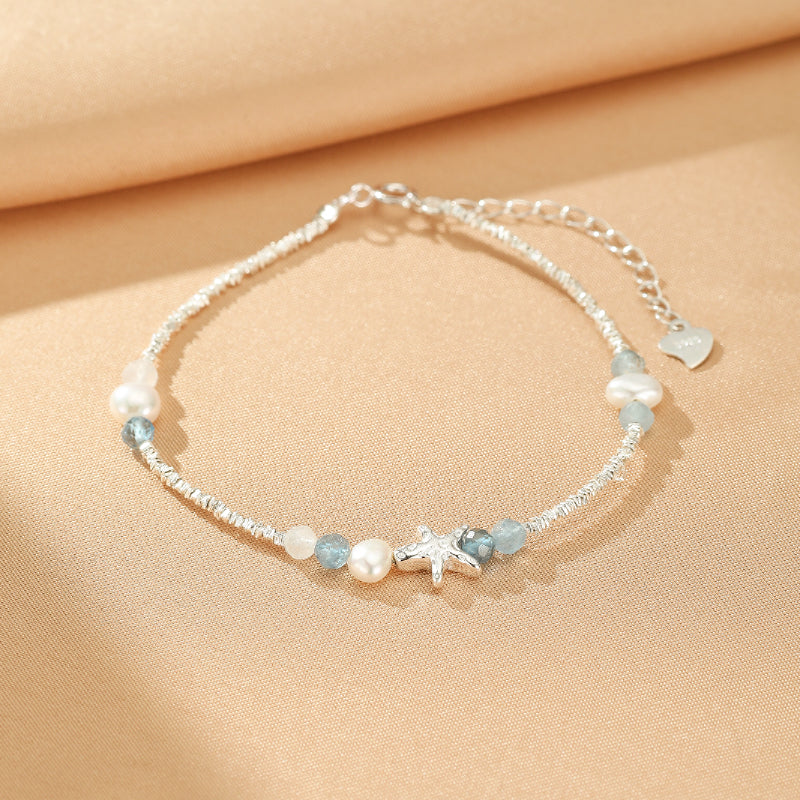 Bracelet en argent S925 orné de perles d'aigue-marine, de perles blanches et d'une étoile de mer, style Vol Marin.