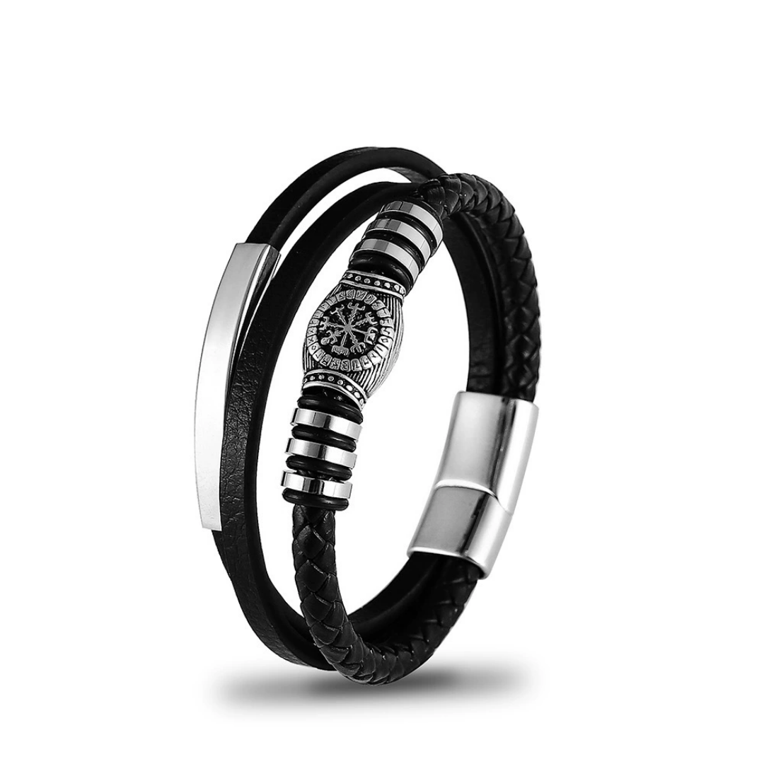 Bracelet homme cuir tressé noir avec fermoir magnétique argenté et ornement central gravé du compas Vegvisir viking.