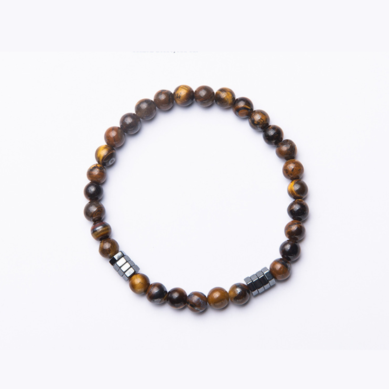 Bracelet homme en pierres d'œil de tigre naturelles avec des perles hématites, symbole de protection et d'ancrage.