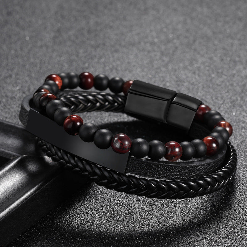 Bracelet pour homme en cuir tressé noir avec perles œil de tigre et fermoir magnétique en acier inoxydable.