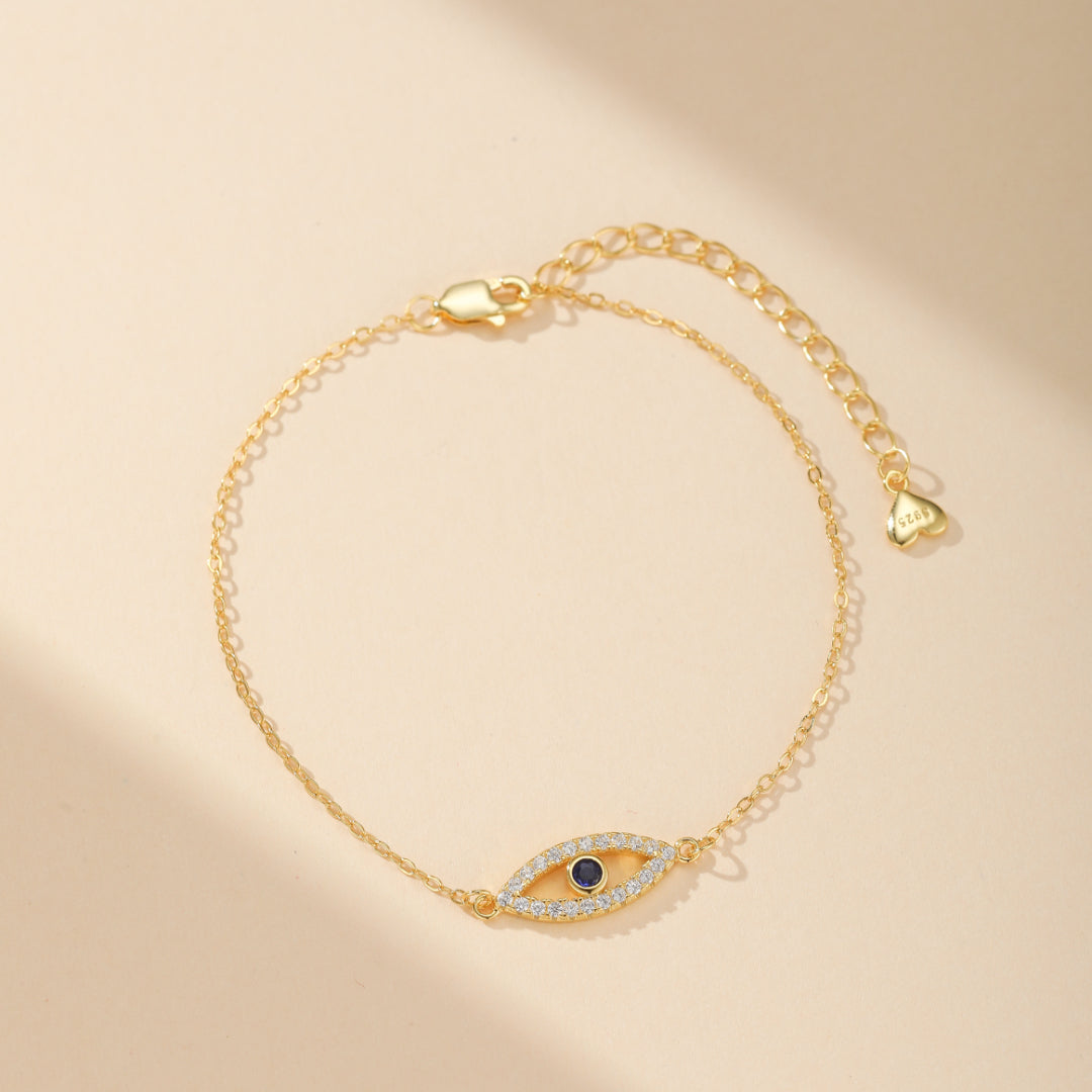 Bracelet fin en argent 925 plaqué or, orné d'un pendentif œil bleu serti de zircons blancs, chaîne avec fermoir mousqueton et pendentif cœur gravé 925.