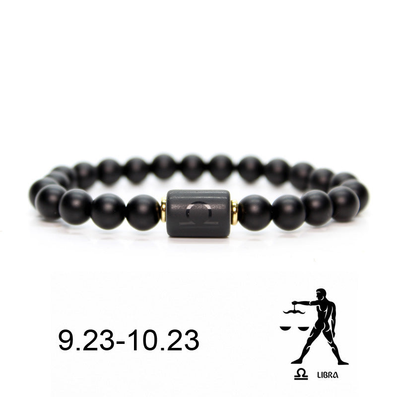 Bracelet en onyx noir avec un pendentif central gravé du symbole de la Balance (Balance) et des dates 9.23-10.23.
