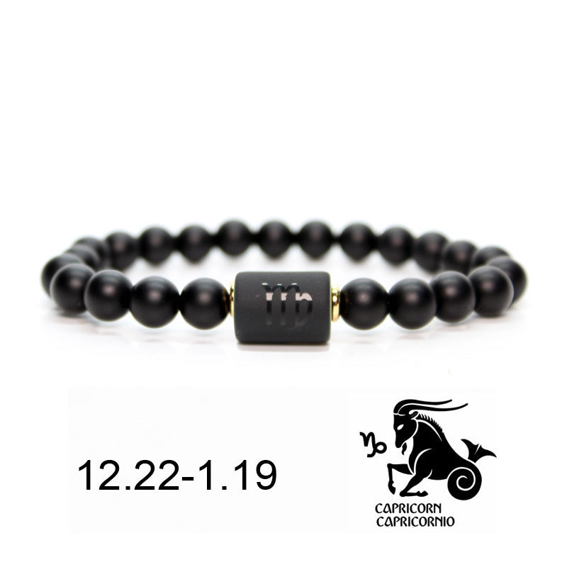 Bracelet en onyx noir avec le signe astrologique du Capricorne gravé sur une perle centrale. Dates du signe : 22.12 - 1.19.