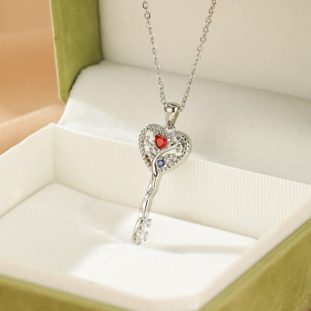 Collier Arbre de Vie en forme de clé, avec un cœur orné de pierres rouges et bleues, en argent