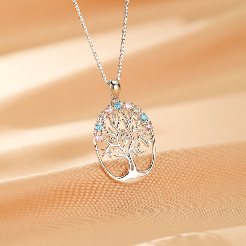 Collier Arbre de Vie en Argent 925 avec des pierres bleues et roses incrustées dans les branches.