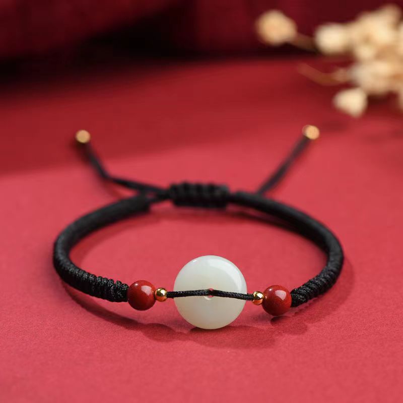 Bracelet "Bonbon" en couleur noire avec la pierre Jade au centre