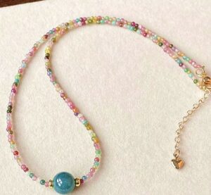 Click to view full screen Collier Jadéite et Tourmaline – Bonheur Arc-en-ciel photo review